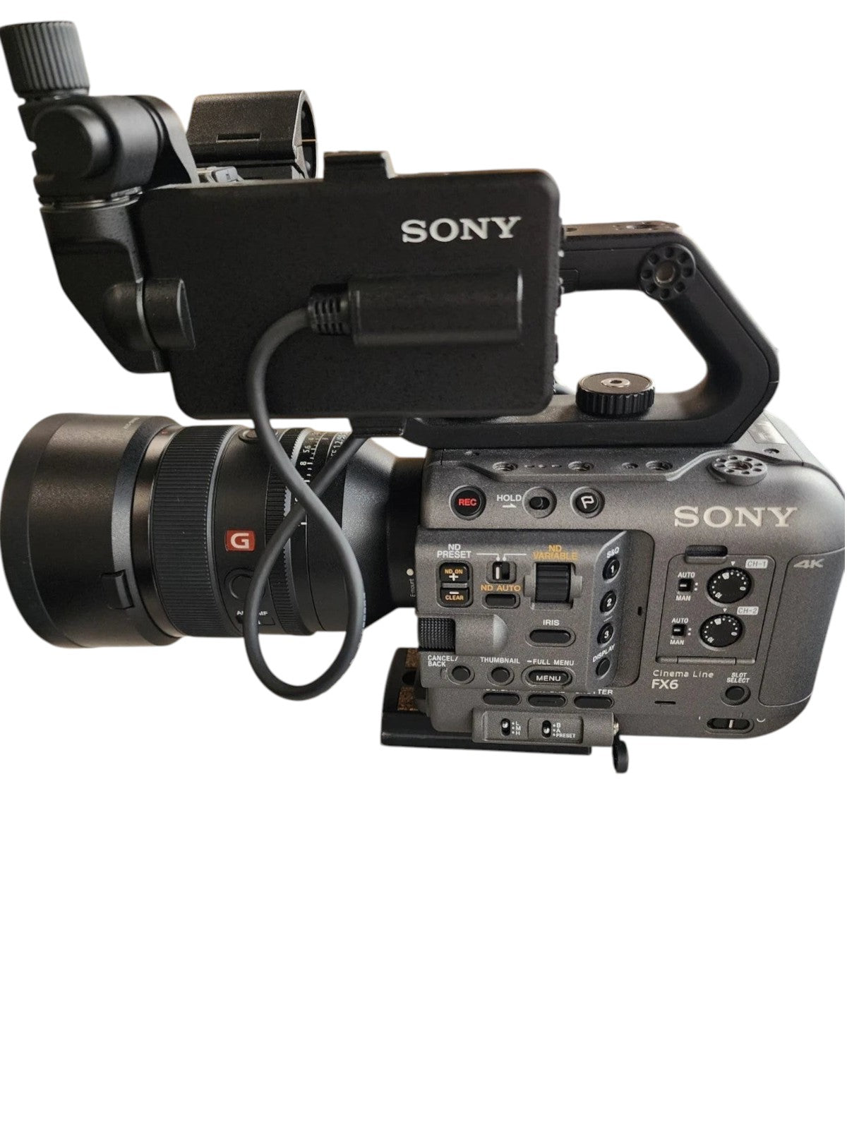 Cymer Sony FX6 professional cinema camera with lens and top handle on a marble surface