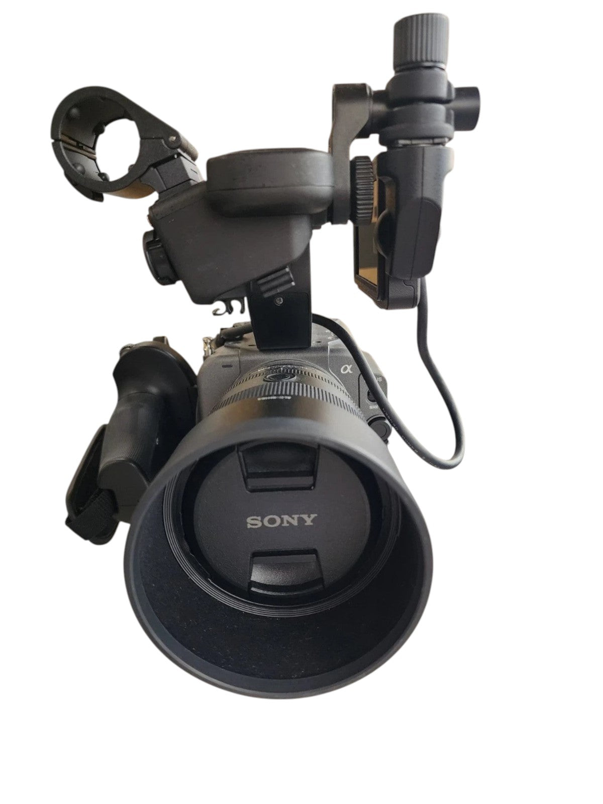 Cymer Sony FX6 professional cinema camera with lens and top handle, featuring a compact modular design on a table.