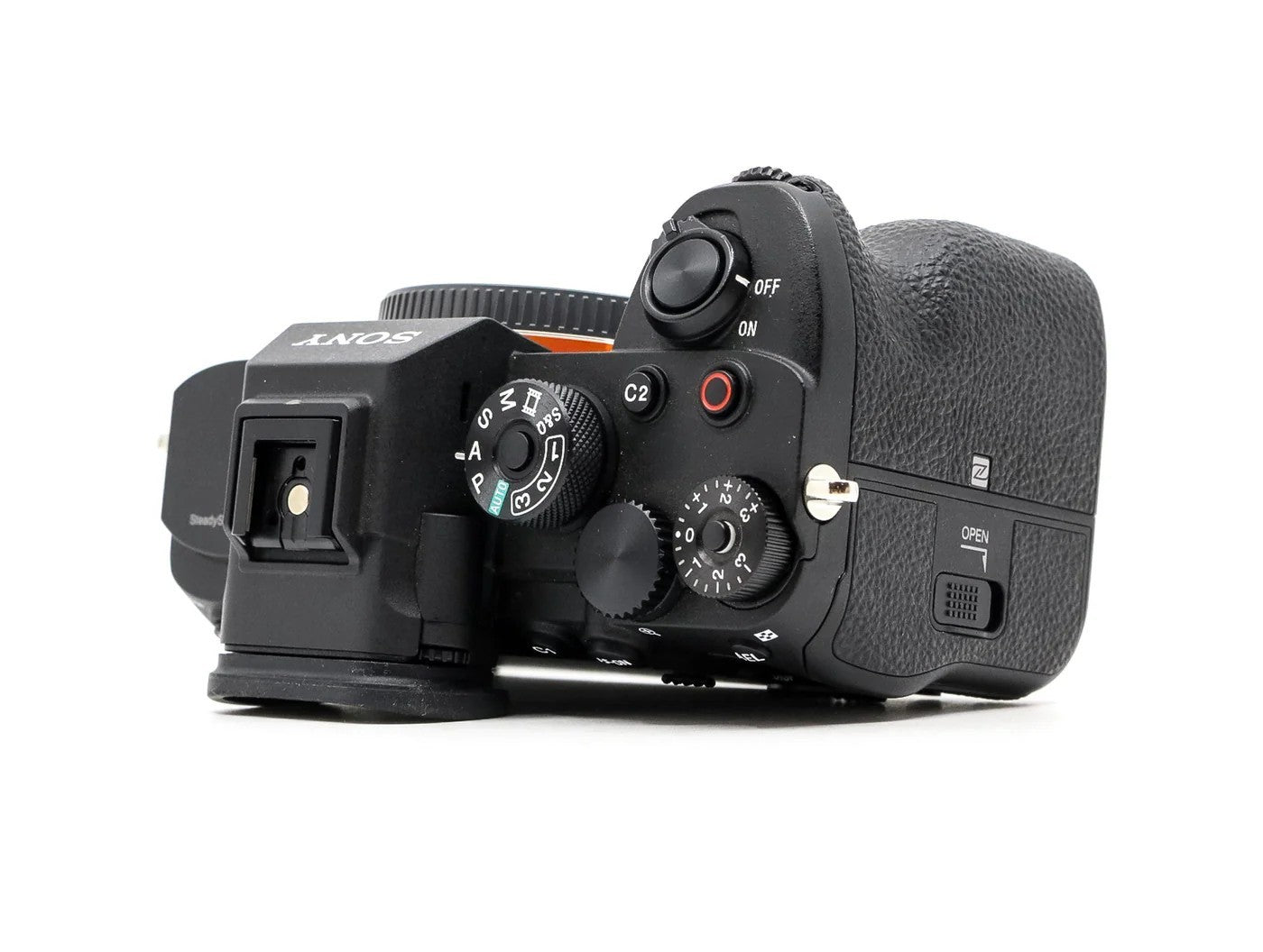 Cymer Sony Alpha full frame mirrorless camera body top view showing mode dial, shutter button, and ergonomic grip